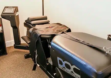 a treatment table in a chiropractic office