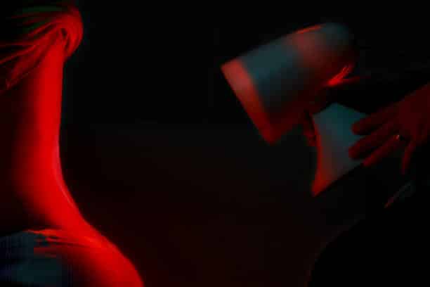back of a woman getting light therapy