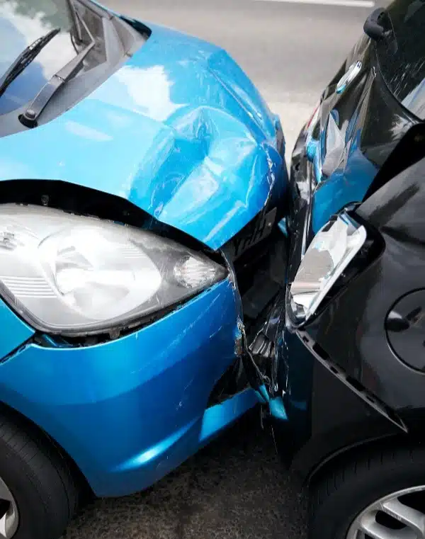 close up of two cars that crashed