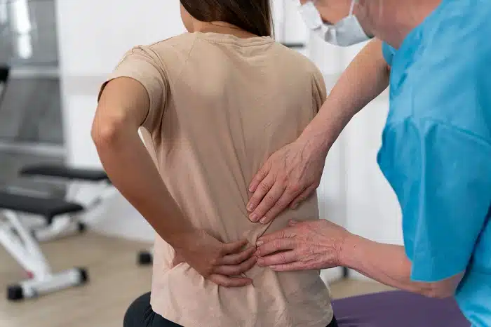 Consultation with a chiropractor for pain relie