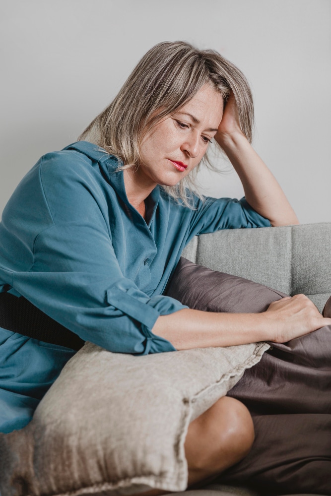 middle aged perimenpausal woman experiencing brain fog | what is perimenpausal 